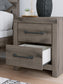 Graystorm King Panel Bed with Mirrored Dresser, Chest and Nightstand