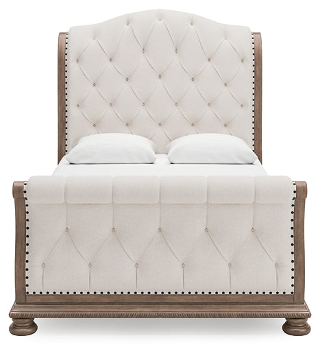 Ardenfield Queen Upholstered Sleigh Bed with Mirrored Dresser