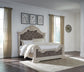 Bruchandi King Upholstered Panel Bed with Mirrored Dresser
