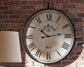 Ashley Express - Augustina Wall Clock Wilson Furniture (OH)  in Bridgeport, Ohio. Serving Bridgeport, Yorkville, Bellaire, & Avondale