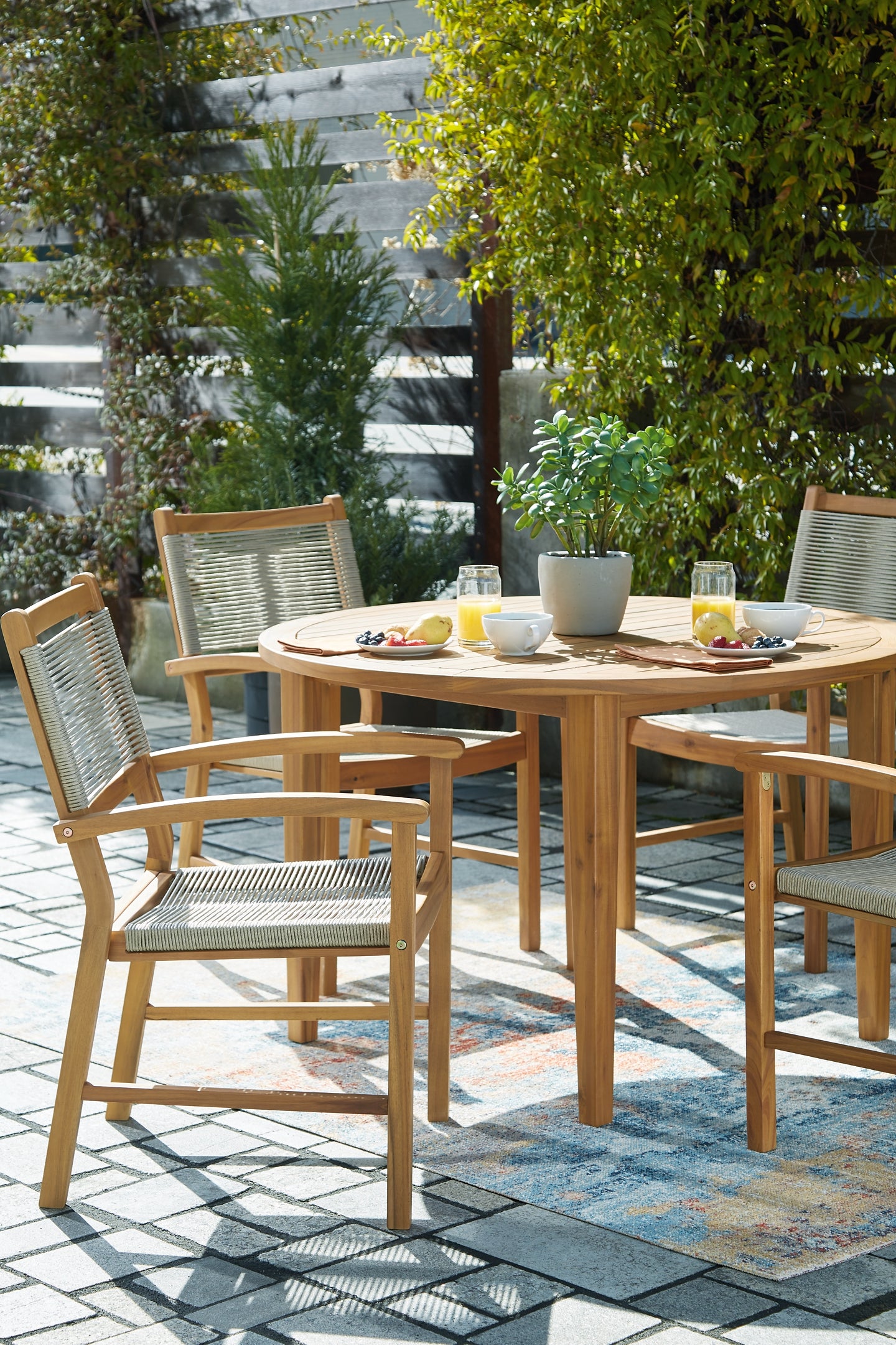 Janiyah Outdoor Dining Table and 4 Chairs Wilson Furniture (OH)  in Bridgeport, Ohio. Serving Bridgeport, Yorkville, Bellaire, & Avondale