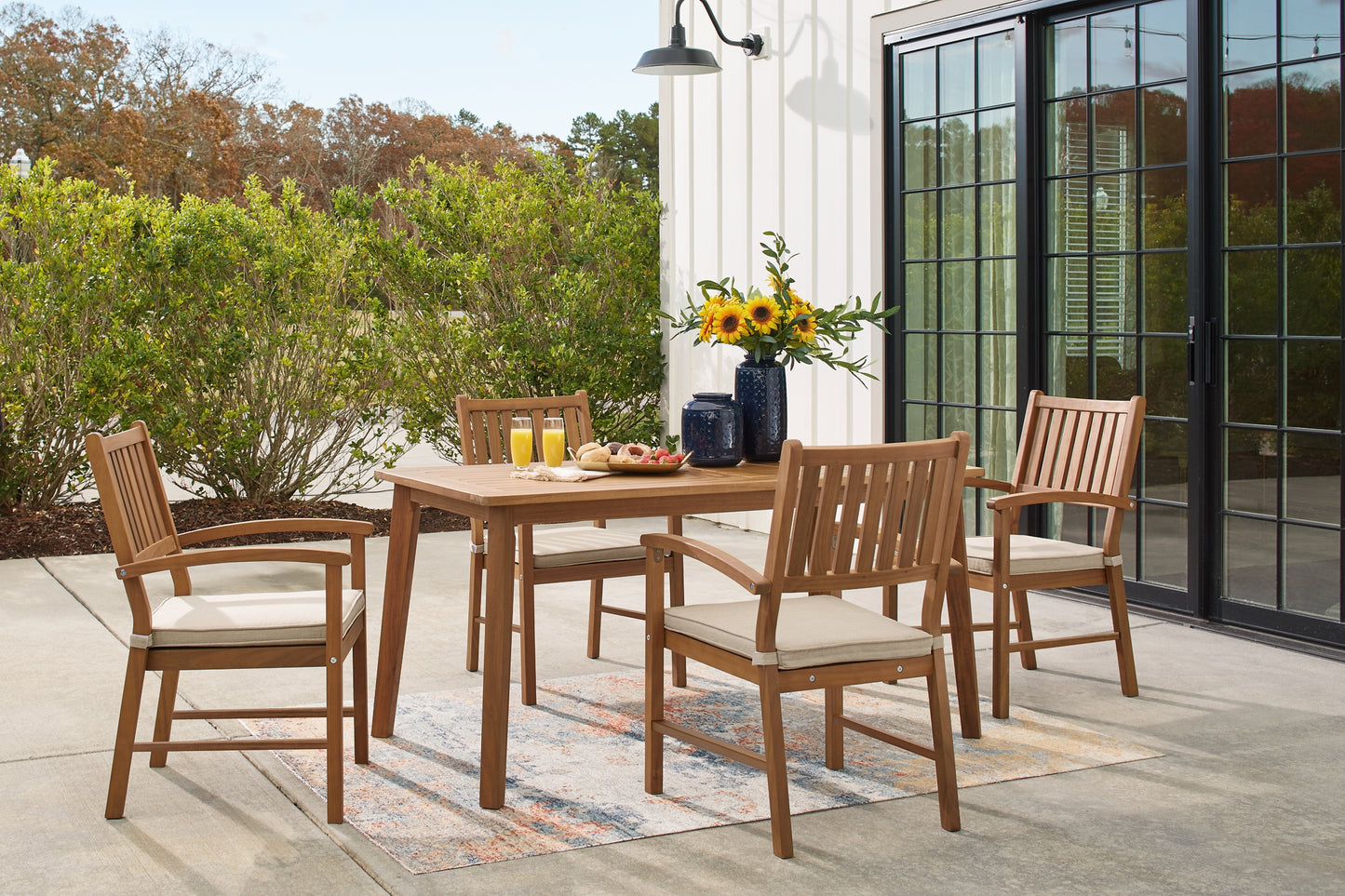 Janiyah Outdoor Dining Table and 4 Chairs Wilson Furniture (OH)  in Bridgeport, Ohio. Serving Bridgeport, Yorkville, Bellaire, & Avondale